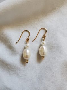 handmade with cultured freshwater pearls Handmade Pearl White Pearl Earrings, Handmade Delicate Pearl Earrings, Handmade Delicate Baroque Pearl Earrings, Handmade Pearl White Dangle Pearl Earrings, Handmade Pearl White Drop Earrings, Handmade Pearl White Drop Pearl Earrings, Handmade Pearl Pendant Earrings For Jewelry Making, Pearl Pendant Earrings For Jewelry Making, Delicate Handmade Baroque Pearl Earrings