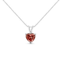 An elegant heart-shaped diamond is the brilliant focal point of this solitaire necklace for her. Set in 14K white gold, this stunning, pink lab grown diamond suspends from an 18-inch box chain that secures with a spring ring. The diamond is masterfully set in a 3 prong, martini setting for maximum dazzle. The simplicity of a perfect diamond will outlast every other piece you own. A brilliantly cut heart shaped diamond emanates pure elegance and love in its gold setting. Goes with anything you care to pair it with – another reason why you'll never want to take this one off. This sweet necklace makes a perfect Valentine's Day gift, or as a way to remember someone close to your heart. It's a classic and feminine piece she'll want to show off every day. Martini Set, Diamond Heart Pendant Necklace, Sweet Necklace, Solitaire Necklace, Pure Elegance, Solitaire Pendant Necklace, Heart Diamond, Solitaire Necklaces, Heart Shaped Diamond