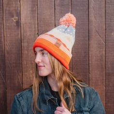 ALL SALES FINAL Stay warm and stylish with our Winter Sunrise Stripe Pom Beanie in vibrant orange and violet. Perfect for chilly days, the beanie features a fun pom and charming stripe design. Embrace the winter sunrise in style! A Montana Scene Original Design. All designs are property of The Montana Scene. All rights reserved.All of The Montana Scene apparel is designed and printed locally in Montana. Come visit our storefront locations! Bigfork * Whitefish * Missoula * Kalispell * Bozeman Winter Orange Adjustable Hat, Winter Orange Hat, One Size Fits Most, Orange Beanie For Winter, Winter Orange Hat, Orange Winter Hat, One Size Orange Winter Hat, Winter Sunrise, Pom Beanie, Vibrant Orange