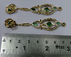 Art Deco 18 K solid gold Diamnds and Emerald dangle earrings. Beautiful one of type pair in very good condition. Length-7.5 cm, width-1.5 cm, the weight of pair-11.210 grams, material-18 K gold, Diamonds and emeralds. Diamond VS GH, approx 2.5 cats. Yellow Gold Pendant Earrings For Anniversary, Gold Diamond Earrings With Elegant Design For Formal Occasions, Gold Long Drop Bridal Earrings, Gold Long Drop Bridal Earrings For Formal Occasion, Ornate Chandelier Earrings For Formal Events, Ornate Gold Diamond Earrings For Formal Events, Ornate Gold Diamond Earrings For Formal Occasions, Yellow Gold Drop Bridal Earrings For Formal Occasions, Formal Yellow Gold Drop Bridal Earrings