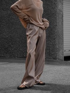 Chic and luxurious silky trousers with wide leg. Super comfortable. Wide leg creates relaxed flowing pants that are easy to wear. Model is in MINUSEY ONE SIZE. ✔️ Free worldwide express shipping over $100 ✔️ Loved by 6,500+ customers ✔️ Limited edition collections, maximum style ⠀⠀⠀⠀⠀⠀⠀⠀⠀ Stay ahead of the trend with can’t-find-anywhere-else staples. Your closet will thank you 💕 * MINUSEY ONE SIZE = EU 34-38, US2-6* 100% Polyester* Dry clean* Made in Korea - Model Height: 172cm/5'7" (US2, EU34) Chic Beige Silk Bottoms, Beige Silk Wide Leg Bottoms, Casual Silk Pants With Relaxed Fit, Casual Silk Wide Leg Loungewear Pants, Casual Silk Wide Leg Pants With Elastic Waistband, Casual Silk Wide Leg Trousers, Solid Silk Wide-leg Pants, Casual Silk Straight Leg Pants, Chic Silk Pants With Relaxed Fit