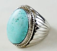 Item #908Z- Men's Navajo Oval Dry Creek Turquoise Sterling Silver Prayer Fans Ring by S.Ray sz. 9 1/4 — Authentic Native Men's Turquoise Rings- EAGLE ROCK TRADING POST-Native American Jewelry Southwestern Style Polished Turquoise Ring, Southwestern Polished Turquoise Ring, Southwestern Oval Jewelry With Polished Finish, Classic Turquoise Ring With Polished Finish, Southwestern Style Oval Jewelry With Polished Finish, Classic Oval Turquoise Gemstone Ring, Western Style Oval Turquoise Concho Ring, Western Style Untreated Oval Turquoise Ring, Southwestern Style Turquoise Oval Ring With Polished Finish