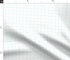 a sheet of paper with lines and squares on it, as well as a ruler