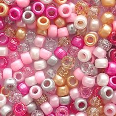 many different colored beads are arranged together