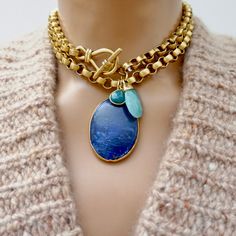 Handcrafted necklace, large vintage Lapis Lazuli pendant gold electroplated, a stunning vintage chain, a gorgeous vintage toggle clasp, a small green Agate gemstone tear drop charm and a larger vintage Amazonite gemstone pendant. Wear it long or doubled with jeans and a t-shirt for a super chic and stylish look. Lapis Luxury Lapis Lazuli Necklace, Luxury Antique Gemstone Necklaces, Artisan Gold Teardrop Pendant Jewelry, Elegant Brass Toggle Necklace, Luxury Necklace With Toggle Clasp As Gift, Elegant Gold Toggle Necklace With Natural Stones, Luxury Necklace With Toggle Clasp Gift, Luxury Brass Gemstone Necklaces, Elegant Toggle Necklace With Natural Stones For Gift