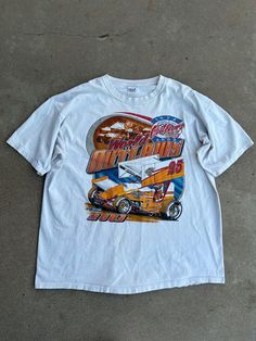 Vintage '03 Sprint Car World Of Outlaws Tee Step back in time with this authentic Sprint Car tee- a must-have for any vintage/racing enthusiasts.   Condition: Signs of wear, small holes in front on graphic. Not super noticeable though. Size: 2XL Cars Tees, Sprint Car, Sprint Cars, Step Back, Vintage Racing, Back In Time, In Time, Halloween Shopping, Gender Neutral