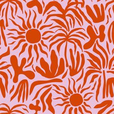 an orange and pink flower pattern on a light purple background with red flowers in the center