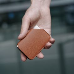 A sleek and exceptionally minimalistic wallet that effortlessly fits into your pocket and contains only the essential items you require. A gentle tap on the corner of the cards enables easy access to all the necessary contents of the wallet. Despite its compact size, it holds everything you need. It is perfect for securely storing your ID and the other six most important cards, keeping them organized in one easily accessible location. ▸ Fits up to 6 cards ▸ Personalize your card holder - add up Modern Card Holder With Interior Slots For Daily Use, Modern Trifold Wallet With Card Slots For Everyday, Modern Wallets For Everyday Use, Modern Trifold Wallet For Everyday Use, Modern Trifold Wallet With Card Slots, Modern Rfid Blocking Card Holder For Daily Use, Versatile Bifold Business Card Holder, Modern Everyday Wallets, Modern Wallets With Card Slots