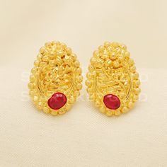 Elevate your style with these beautifully handcrafted gold earrings. Featuring a classic design and a comfortable fit, they add a refined touch to any look. Ideal for everyday wear or special occasions, they bring a subtle yet sophisticated sparkle. 22k Gold  Stud Earrings Metal is Real Gold Purity is 22kt  Weight is 4.15 grams approx Max Length is 1.9 cm approx Max width is 1.4 cm approx ,  The Earrings comes with normal backs if you need gold screw please contact Please feel free to ask if you Elegant Intricate Design Earrings For Puja, 22k Gold Elegant Temple Jewelry Earrings, Traditional Yellow Gold Plated Clip-on Earrings, 22k Gold Temple Jewelry Earrings With Elegant Design, Elegant 22k Gold Temple Jewelry Earrings, 22k Gold Bridal Earrings For Diwali, Formal 22k Gold Temple Jewelry Earrings, 22k Gold Earrings For Formal Festive Occasions, Elegant Yellow Gold Earrings For Puja