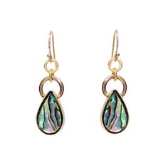 The "Awestruck Abalone Dangle Earrings" are a mesmerizing testament to the captivating beauty of the ocean, encapsulating the iridescence and allure of the deep sea within their graceful design. Crafted with exquisite attention to detail, these earrings are destined to leave admirers spellbound with their ethereal charm.The abalone shells dangle gracefully, swaying with the wearer's every movement. Their iridescent surfaces catch the light, casting a luminous glow that illuminates the face and a Elegant Abalone Shell Teardrop Earrings, Elegant Teardrop Abalone Shell Earrings, Teardrop Abalone Shell Jewelry With Matching Earrings, Pearl Collection, Candle Collection, Abalone Shell, Deep Sea, The Deep, Men's Collection