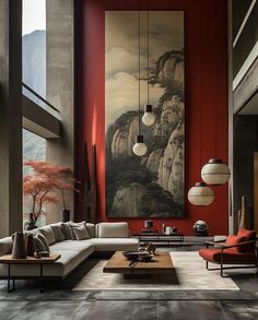 a living room filled with furniture and large painting on the wall above it's windows