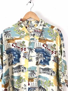 "-Description- >colorful island resort print men's hawaiian shirt >button front >collared >button close pocket on the front >mens XL >awesome print! >condition: great >color(s): multi >fabric(s): 100 rayon >brand: preswick & moore >care: machine wash -Measurements- >size: XL ✩ all measurements are taken with the item laying flat & some sizes are estimates so please check measurements ✩ chest: 50\" / 127cm length: 31\" / 78cm shoulder to sleeve end: 11\ Long Sleeve Hawaiian Shirt With Floral Print For Beach, Long Sleeve Hawaiian Shirt For Vacation, Printed Long Sleeve Hawaiian Shirt For Vacation, Multicolor Vintage Print Vacation Tops, Multicolor Vintage Print Tops For Vacation, Multicolor Tops With Vintage Print For Vacation, Multicolor Long Sleeve Hawaiian Shirt, Vacation Tops With Vintage Print And Camp Collar, Multicolor Vintage Print Beach Top