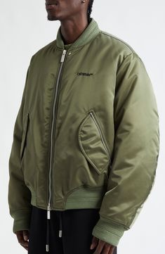 An olive-green hue underscores the military-inspired aesthetic of this nylon bomber jacket embroidered with the label's Bookish logo and signature arrows. Two-way front-zip closure Blade collar Ribbed cuffs Front zip pockets Ribbed hem Lined, with polyester fill 100% polyamide Spot clean Made in Italy Designer Clothing Black Owned/Founded Green Embroidered Logo Outerwear For Streetwear, Off-white Logo, Inspired Aesthetic, Clothing Black, Military Inspired, Four Leaf, Leaf Clover, Four Leaf Clover, Logo Embroidered