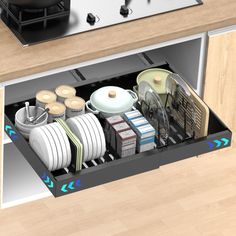 an open dishwasher drawer with dishes and pans on the bottom, next to a stove