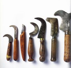 seven different types of hammers lined up in a row