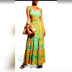 This Maxi Dress Features A Bright Print, A Flattering Shirred Waistband, And Tiered Skirt. V-Neck Braided Shoulder Straps Back Concealed Zipper Tiered Skirt Polyester Dry Clean Imported Size & Fit Maxi Silhouette About 54" From Shoulder To Hem Elegant Yellow Sundress For Vacation, Bohemian Mustard V-neck Dress, Mustard V-neck Bohemian Dress, Mustard Bohemian V-neck Dress, Yellow Bohemian V-neck Maxi Dress, Yellow Bohemian Maxi Dress With V-neck, Bohemian Yellow Maxi Dress With V-neck, Chic Mustard V-neck Maxi Dress, Yellow V-neck Maxi Dress For Vacation