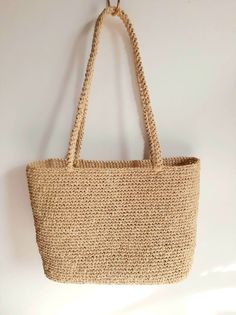 Straw Handheld Bag For Everyday Use, Natural Tote Bag For Daily Use, Natural Handheld Crochet Bag With Large Capacity, Natural Color Large Capacity Handheld Beach Bag, Natural Large Capacity Handheld Beach Bag, Handheld Large Capacity Natural Beach Bag, Everyday Rectangular Natural Fiber Bag, Everyday Natural Fiber Shoulder Bag, Rectangular Everyday Bag In Natural Fiber