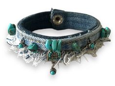 Discover the beauty of sustainable fashion with this exclusive bracelet, handcrafted from pre-washed, recycled denim jeans. Each bracelet is a unique creation, featuring a blend of rustic charm, boho chic  design. Materials: *Recycled Denim and jewelry parts *Turquoise Natural Stones *Metal Snap Fastener Features: *Bracelet Width: 3/4 inch *Bracelet Length: 7, 3/4 inches *comfortable fit for wrist sizes 7" *Lightweight and flexible for a personalized fit *Distinctive frayed edges for a bohemian Casual Handmade Bracelets For Festivals, Casual Turquoise Bracelets For Festivals, Hippie Turquoise Bracelets For Festival, Casual Handmade Festival Jewelry, Casual Handmade Jewelry For Festivals, Rustic Blue Jewelry For Festival, Handmade Blue Denim Jewelry, Rustic Blue Adjustable Bracelets, Rustic Adjustable Blue Bracelets