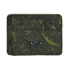 PRICES MAY VARY. 100% Recycled Polyester made from post consumer plastic bottles is lightweight and breathable Double-sided wallet with 6 card slots Slim silhouette, combining high storage capacity while remaining sleek and non-bulky Oakley Ellipse silicone logo for branding statement Visit Oakley.com to shop the entire Oakley apparel assortment Functional Green Rectangular Wallet, Cool Wallets, Best Wallet, Plastic Bottles, Card Wallet, Special Features, Card Slots, Slots, Wallets