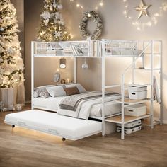 a white bunk bed sitting on top of a wooden floor next to a christmas tree