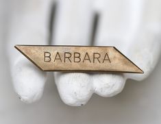 This striking brass brooch is engraved with the name: Barbara Roughly 45mm long and 9mm wide, in great solid vintage condition, only slightly oxidised by time. For more vintage jewellery and jewellery components: https://www.etsy.com/uk/shop/MeangleanAlchemist?ref=seller-platform-mcnav&section_id=26263411 Back to shop: https://www.etsy.com/uk/shop/MeangleanAlchemist?ref=seller-platform-mcnav Barbara Name, Brass Brooch, Name Badges, Asymmetrical Design, Vintage Brooch, Vintage Jewellery, Lapel Pin, Design Vintage, Vintage Brooches