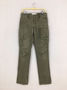 "Size 30x32 Japanese Back Number Slim Fit Cargo Pants Olive Slim Skinny Fit Pants Casual Multi Pocket Utility Streetwear Tactical Pant W30 Please contact me for any questions about this clothing before buying. SIZE MEASUREMENTS :- WAIST : 30\" inches HIPS : 36\" inches THIGH: 20\" inches LEG OPENING : 14\" inches RISE : 11\" inches INSEAM : 32\" inches OUTSEAM (TOTAL LENGTH) : 42\" inches WEIGHT : 0.60 kg Condition : Good Condition. No holes and no stains. Please pay close attention to measureme Straight Leg Cargo Pants For Hiking, Utility Cargo Pants For Hiking, Straight Leg, Utility Cargo Pants For Outdoor With Zip Fly, Straight Leg Hiking Pants With Pockets, Full-length Cargo Pants With Pockets For Outdoor Work, Full-length Cargo Pants For Outdoor Work, Hiking Straight Leg Pants With Pockets, Utility Cargo Pants With Zip Fly, Combat Pants With Straight Leg And Hip Pockets