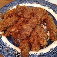 fried food on a blue and white plate