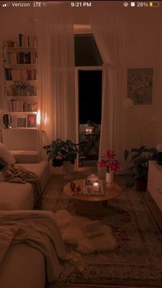 a living room filled with lots of furniture and decor