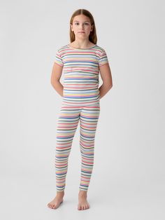 Soft cotton PJ set.  Crewneck.  Long sleeves.  Elasticized waist at PJ pants.  Banded cuffs.  Allover print.  Made with 100% organically grown cotton.  Organic cotton is better for people and the environment because it's grown without the use of harmful synthetic pesticides and fertilizers.  Straight, easy fit.  Easy pull-on waist. Female Wears, Cotton Pjs, Fitness Wear Outfits, Marilyn Monroe Photos, Cute Lazy Outfits, Lazy Outfits, Pj Pants, Gap Kids, Girls Pajamas