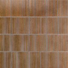 a brown and white wall with lines on it