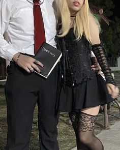 a man and woman dressed up for halloween