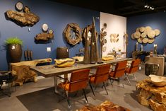 a room filled with lots of different types of wooden furniture and decorations on the walls