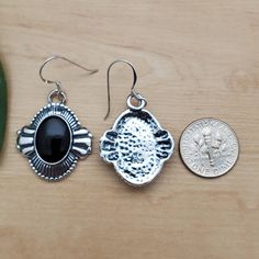 Visit our on-line shop at: Etsy.com/shop/AlbuquerqueDesigns *sterling silver earrings / big concho earrings *dangles / hooks / ear wires / boho earrings *southwestern *black onyx / black stone *calibrated pre-cut stones: big 14x10mm oval shape *back of jewelry items are all covered / do not show the back of stones *all jewelry items are made to ship, slight variations in stones will occur comparing to pictures. *size of a penny is 19mm or a dime is 18mm in diameter for comparing size with jewelr Black Sterling Silver Jewelry With Matching Earrings, Vintage Black Dangle Jewelry, Sterling Silver Black Enamel Drop Earrings, Sterling Silver Drop Earrings With Black Enamel, Silver Teardrop Jewelry With Black Enamel, Nickel-free Black Dangle Jewelry, Black Enamel Sterling Silver Drop Earrings, Nickel-free Black Dangle Plug Earrings, Black Dangle Plug Earrings Nickel Free