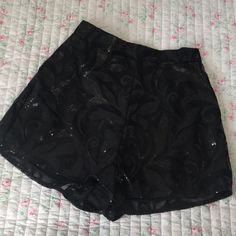 Black Sequin High Waisted Short Fly Zip With Hook Closure Nwot- Never Worn Polyester Size: Medium - Perfect For A Size 6 Laying Flat Measurements Waist: 13.5 Inches Rise: Approximately 15.5 Inches Summer Evening Shorts, Summer Evening Short Bottoms, Summer Evening Short Length Bottoms, Short Length Summer Evening Bottoms, Elegant Shorts For Night Out With Short Inseam, Elegant Shorts With Short Inseam For Night Out, Elegant Shorts For Night Out With Short Leg, Elegant Shorts For Night Out, Black Shorts With Built-in Shorts For Night Out