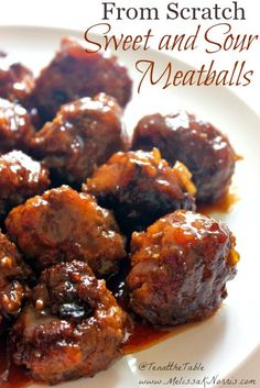 some meatballs on a white plate with sauce