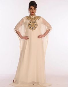 Subhanallah Dubai Off White Georgette Hand Embroidery Party Wear Kaftan 👗 Buy latest Kaftan which are made up from best quality fabrics with latest styles from our large collections at arabicattire.com Shop Now : https://bit.ly/3zHLaFh Buy online @ $67 #designerkaftan #kaftandressespakistani #kaftangown #kaftannearme #kimonokaftan #pakistanikaftandress Luxury Wedding Tunic For Eid, Luxury Beige Thobe For Eid, Luxury Eid Thobe With Zari Work, Luxury Reception Kaftan For Eid, Luxury Bollywood Thobe For Eid, Kaftan Moroccan Caftan, Kaftan Gown, Modest Evening Dress, Zari Embroidery