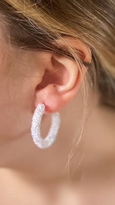 FINAL SALE these small glitter hoop earrings from mary kathryn design are a fun addition to any outfit for a little bit of happiness. whether you're looking for a fun accent color, a pair for game day or a more neutral look - we have assorted colors to choose from! 35mm latchback style closure. some minor shedding of glitter is expected. Trendy Sparkling Hoop Earrings, Small Hypoallergenic Hoop Earrings For Parties, Hypoallergenic Small Hoop Earrings For Party, Small Designs, Accent Colors, Glitter, Hoop Earrings, Blue And White, Silver