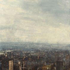 an aerial view of a city with skyscrapers and clouds in the sky, taken from above