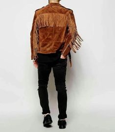 Men's brown suede leather jacket with fringe detailing, featuring a Western-inspired design. Premium Suede Leather: Crafted from high-quality suede leather, offering durability and a soft, supple feel that only gets better with time. Versatile Design: Suitable for all seasons, making it a perfect addition to your wardrobe for any occasion, from casual outings to special events. Distinctive Fringe Style: Features eye-catching fringe detailing that adds a unique Western and vintage flair to your outfit. New with Tags: Each jacket comes brand new with tags, ensuring you receive a fresh, untouched product. Custom Sizing Available: If your size is not listed, choose the custom option, and get a jacket tailored to your measurements. Made-to-Order: Each jacket is handmade and takes approximately Leather Fringe Jacket, Suede Jacket Men, Suede Biker Jacket, Suede Biker, Mens Leather Pants, Fringe Fashion, Fringe Leather Jacket, Leather Apron, Suede Fringe Jacket