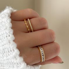 If you love intricacy, this is the ring for you. Six crystals are carefully placed and laden with milgrain detailing between and around the stones. Just a stunning feat of art on a dainty band.  MATERIALS: Gold Plated, Brass Cubic Zirconia  Need some jewelry inspiration? Follow us on Instagram @statementGrey Pave Eternity Band, Milgrain Ring, Dainty Band, Minimal Ring, Eternity Band Ring, Gold Band Ring, Gifts For My Sister, Stackable Ring, Affordable Jewelry