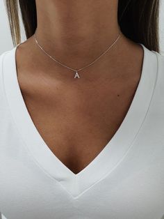 "Gorgeous inital pendant necklace made of sterling silver set with cz zircons, making a simple but elegant statement. The perfect layering piece or minimalist necklace. This necklace is perfect to wear as everyday jewelry and combined layered with other necklaces. Hypoallergenic, lightweight and minimalist. ► FEATURES: * Sterling silver pave disc pendant necklace. ► MEASUREMENT : Chain length: 13\" / 33 cm In addition you will receive an extender chain of 5 cm \\ 2\" for you to enjoy controlling Initial Necklace Diamond, Jewish Necklace, Silver Eye, Necklace For Girlfriend, Letter Charm, Necklace Diamond, Cz Necklace, Solitaire Necklaces, Tiny Diamond