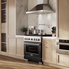 a kitchen with an oven, stove and counter tops in wood paneled cabinetry