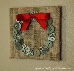 a button wreath is hanging on the wall