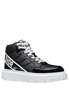 The D-Player sneaker draws inspiration from the basketball shoe and offers a modern variation on a timeless style. The quilted nylon style is enhanced by patent details and is further distinguished by a black CHRISTIAN DIOR signature on the band at the back. The supple and lightweight sole completes the contemporary sneaker.Round toeTreaded soleLace-upUpper: Technical Fabric, Leather; Sole: EVAMade in Italy Luxury High-top Custom Sneakers With Translucent Outsole, Luxury Custom High-top Sneakers With Translucent Outsole, Luxury High-top Sneakers With Boost Midsole For Sports, Designer High-top Platform Sneakers With Contrast Sole, Designer High-top Custom Sneakers With Translucent Outsole, Luxury High-top Sports Sneakers, Luxury High-top Sneakers With Round Toe For Sports, Luxury Lace-up High-top Sneakers With Translucent Outsole, Luxury Black High-top Sneakers For Streetwear