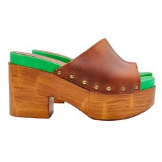 Women's clogs with brown polyurethane base (wood effect) Brown leather upper Green insole 9.5 cm wide heel and 5 cm plateau Lightweight and comfortable Entirely made by specialized Italian personnel Handcrafted using the best materials BEFORE PURCHASING DO NOT FORGET TO CHECK THE SIZE! Green Open Toe Mules With Leather Sole, Green Leather Mules With Open Heel, Green Open Toe Leather Mules, Green Round Toe Platform Mules, Green Leather Open Toe Mules, Green Leather Open Heel Mules, Green Leather Open-heel Mules, Brown High Heels With Rubber Heel Cap, Brown Wedge Heel Clogs With Leather Sole