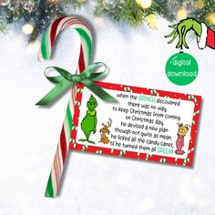 a christmas card with a candy cane attached to it and an elf's message