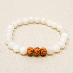 These bracelets are made using high-quality 6mm beads that come in three different sizes - Small (5inches-6inches), Medium (6inches-7inches), and Large (7inches-8inches) - to ensure a comfortable and secure fit on any wrist. Each bracelet features three Rudraksha Seed beads, which act as diffusers, releasing the essential oils into your skin as you wear them, providing the perfect dose of aromatherapy for relaxation during your busy schedule. Essential Oil Case, Chip Carving, Diffuser Jewelry, Gemstone Meanings, Stone Chips, Diffuser Bracelets, Busy Schedule, Worry Stones, Saint George