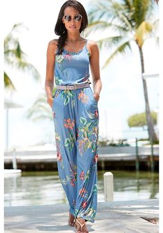 Take your fashion game to the next level with this lovely relaxed fit jumpsuit in a tropical floral print. Summer Tropical Print Jumpsuits For Day Out, Summer Floral Print Maxi Jumpsuits And Rompers, Sleeveless Floral Print Jumpsuits And Rompers For Beach, Summer Tropical Print Jumpsuits And Rompers For Day Out, Sleeveless Tropical Print Jumpsuits For Spring, Spring Tropical Print Jumpsuit For Day Out, Spring Tropical Print Jumpsuits And Rompers For Day Out, Spring Day Out Tropical Print Jumpsuit, Summer Floral Print Jumpsuits And Rompers