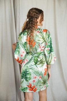 Mint Tropical Satin Robe – Spikes and Seams Green Printed Sleepwear For Vacation, Tropical Print Kimono For Beach Season, Green Summer Sleepwear With Kimono Sleeves, Tropical Beach Season Kimono With Tropical Print, Summer Sleepwear Kimono With Prints, Tropical Printed Kimono With Kimono Sleeves, Green Kimono Sleeves Sleepwear For Summer, Tropical Style Summer Vacation Sleepwear, Tropical Summer Vacation Sleepwear