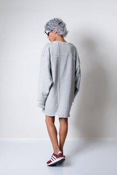 "*Extra Long Sleeves *Oversized Fit *Dropped Shoulder *Please, have in mind that there are elements in the garment that are not hemmed, on purpose! *Model is 1.64cm (5ft 3\") tall, 50 kg (110Lbs) and wears size Small SIZE CHART SIZE XS US/Canada 2 UK 4 Europe 32 Australia 6 Japan 5 Bust: around 33 in/84 cm Waist: around 26 in/66 cm Hip: around 35.5 in/90 cm Approx height: 5'7\"/170 cm SIZE S US/Canada 4/6 UK 6/8 Europe 34/36 Australia 8/10 Japan 7/9 Bust: around 35 in/88 cm Waist: around 28 in/7 Oversized Grey Sweater, Stocking Fillers For Her, Extra Long Sleeves, Glamorous Style, Sweater Grey, Sweater Jumper, Loose Sweater, Cozy Fashion, Oversized Sweater